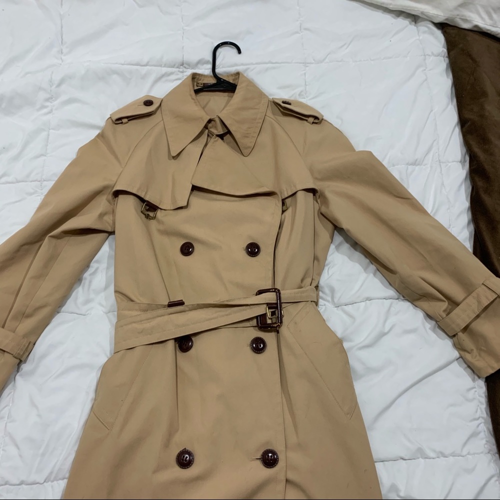 Tan knee length trench coat